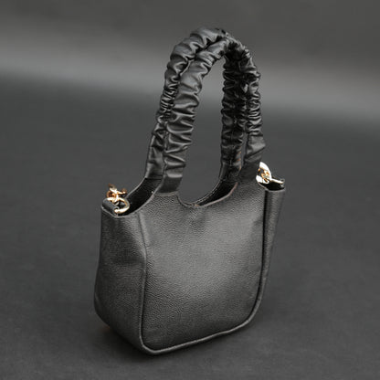 Black sheep croco leather bag with straps and pockets.