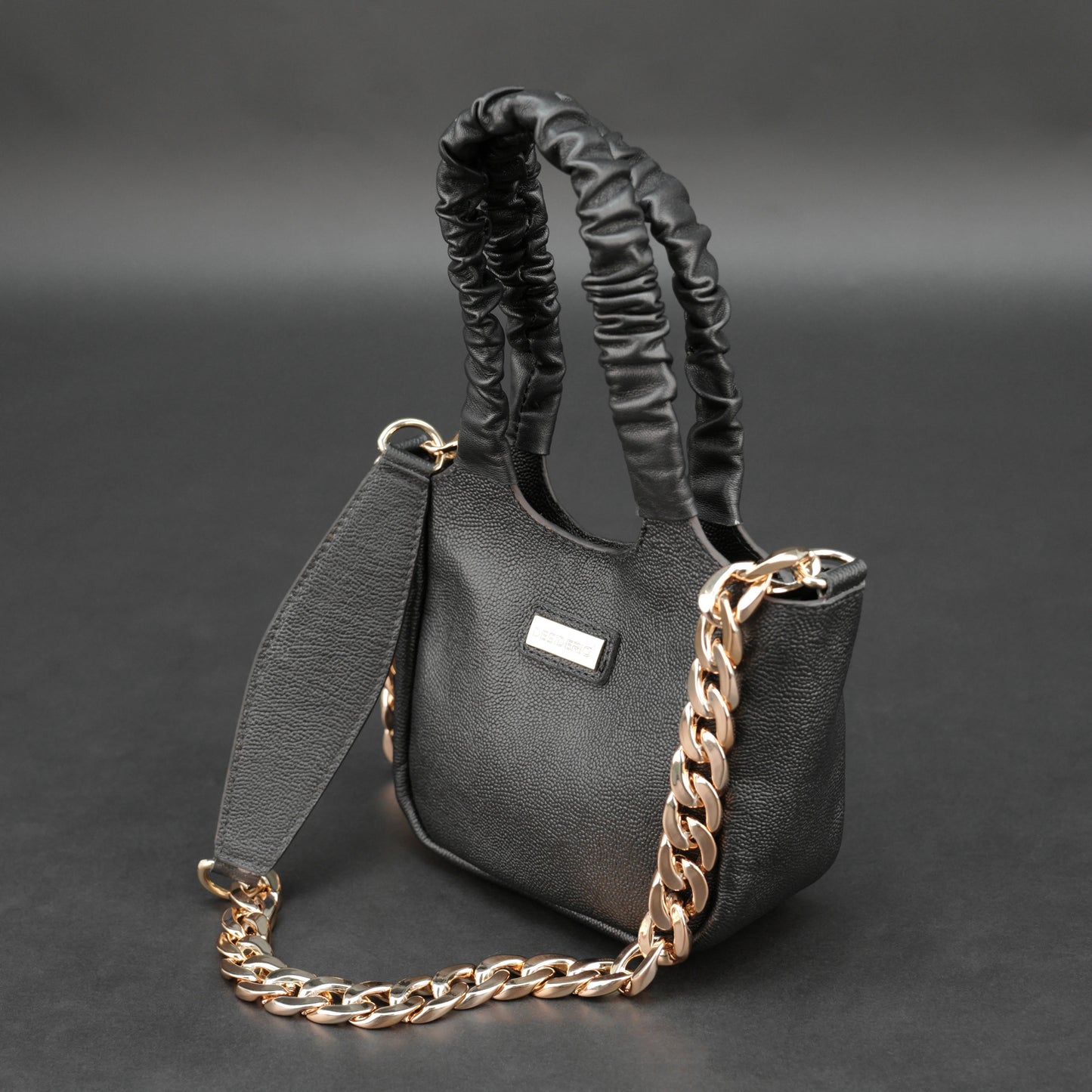 Black sheep croco leather bag with straps and pockets.