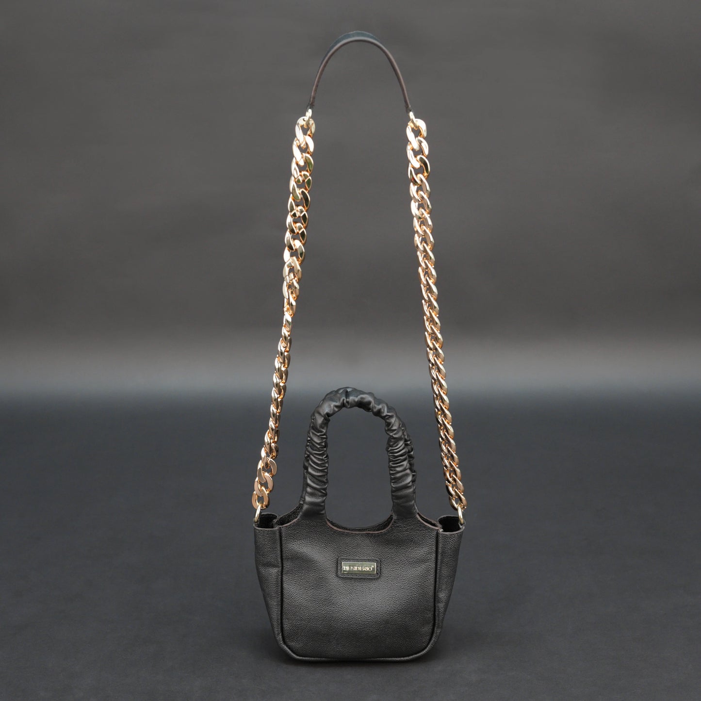 Black sheep croco leather bag with straps and pockets.
