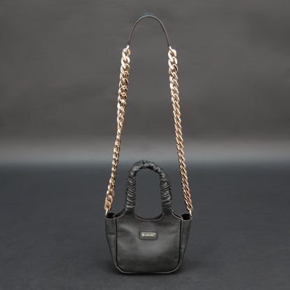 Black sheep croco leather bag with straps and pockets.