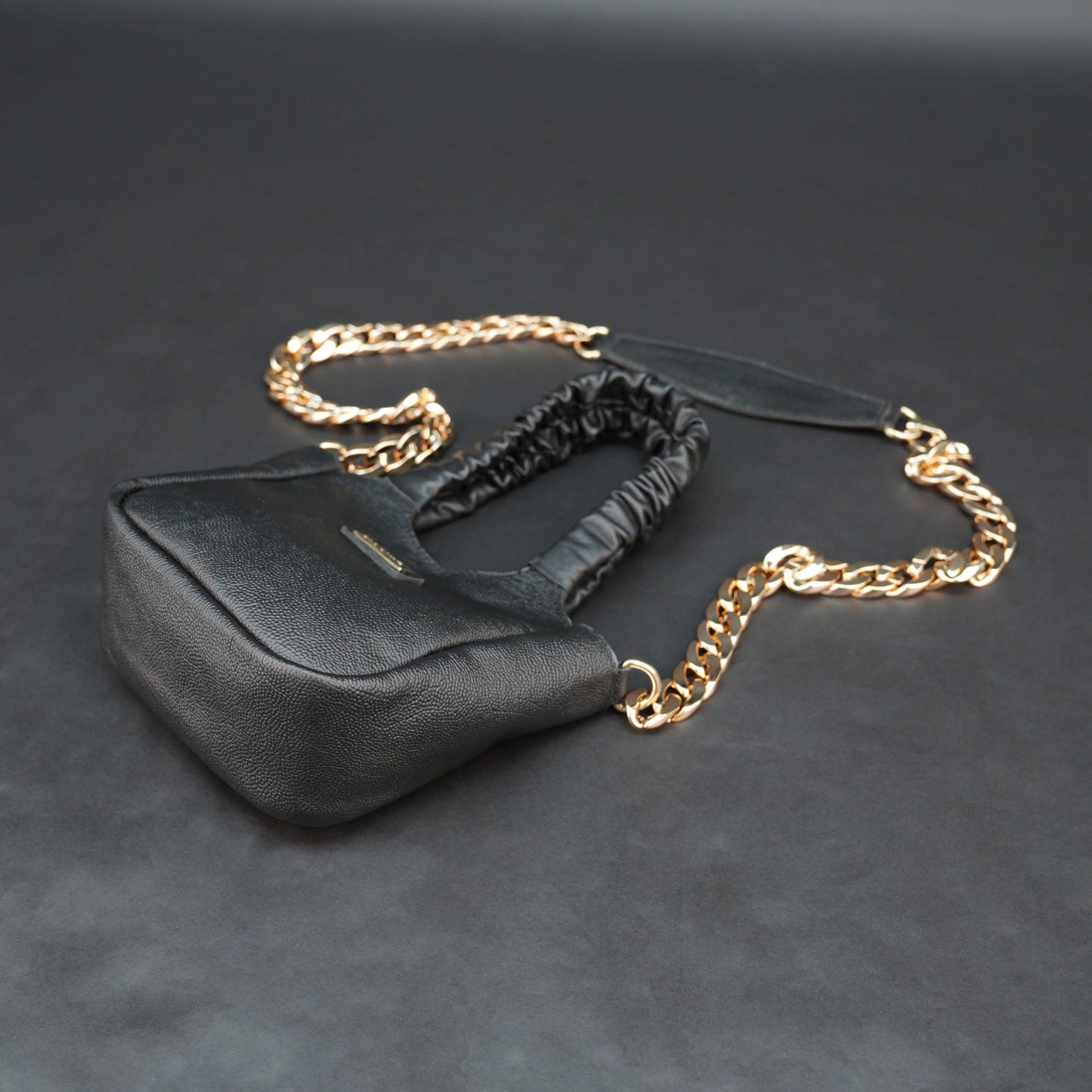 Black sheep croco leather bag with straps and pockets.