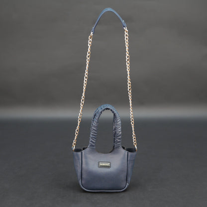 Deep blue premium cow leather bag with shoulder strap, main compartment, and inner pocket.