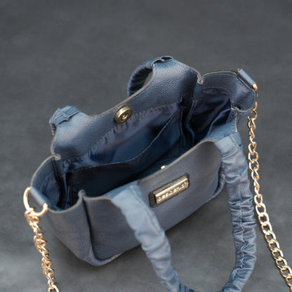 Deep blue premium cow leather bag with shoulder strap, main compartment, and inner pocket.