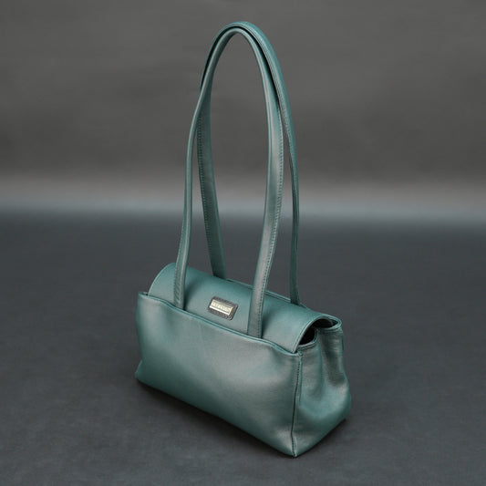 Deep jade cow Bamie leather bag with straps, dual compartments, and zipper pocket.