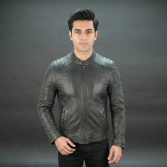 Black leather jacket with mandarin collar, quilted shoulders, and slim fit.