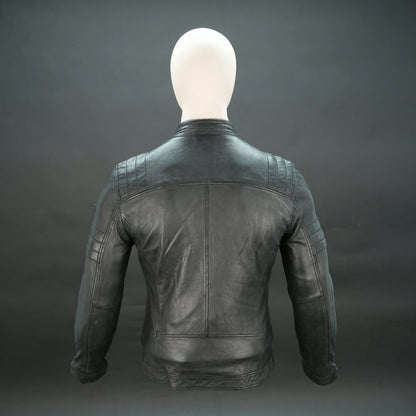 Black leather jacket with mandarin collar, quilted shoulders, and slim fit.