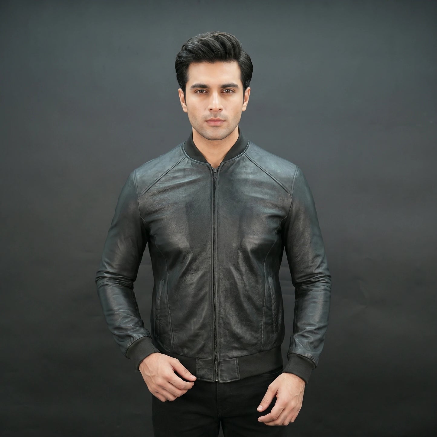 Men's black leather bomber jacket with ribbed collar and slim fit