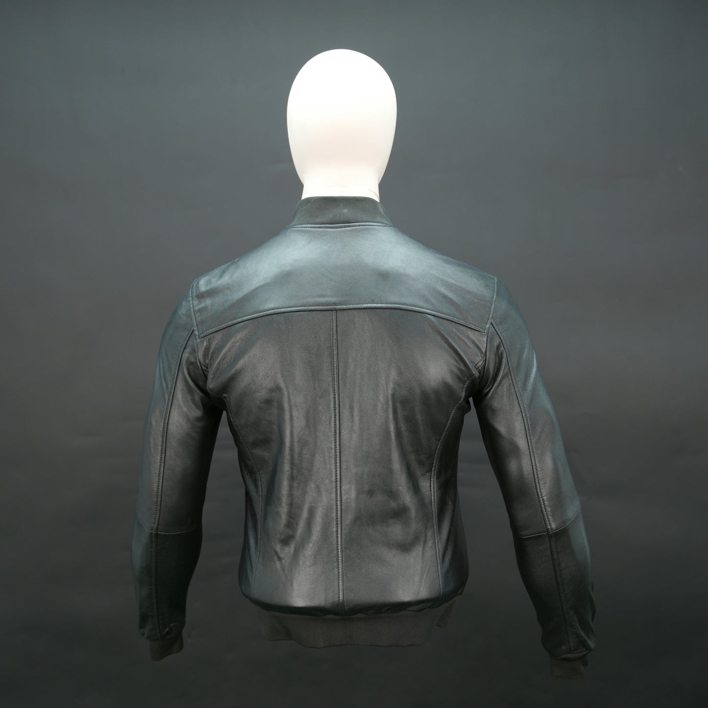 Men's black lambskin bomber jacket with ribbed collar and slim fit