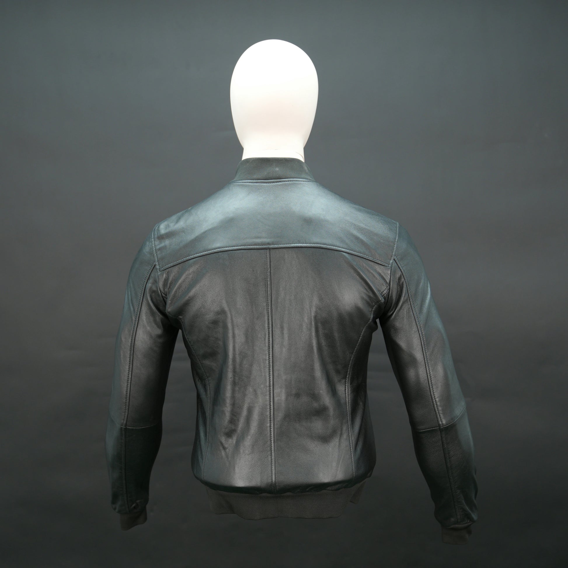 Men's black lambskin bomber jacket with ribbed collar and slim fit