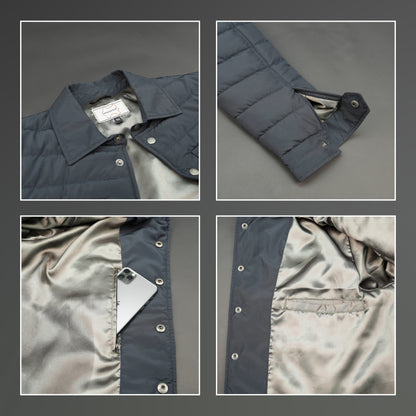 Men’s navy button-down quilted puffer jacket with six pockets, full sleeves, and snap closure.
