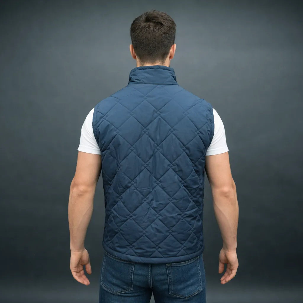 Men’s navy double diamond puffer vest sleeveless gilet with zip closure and pockets for layering.