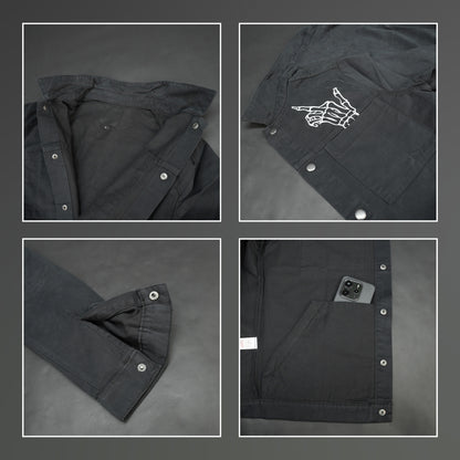 Men’s black denim jacket with bold finger print graphic, button-down front, adjustable cuffs, and side pockets, casual relaxed fit