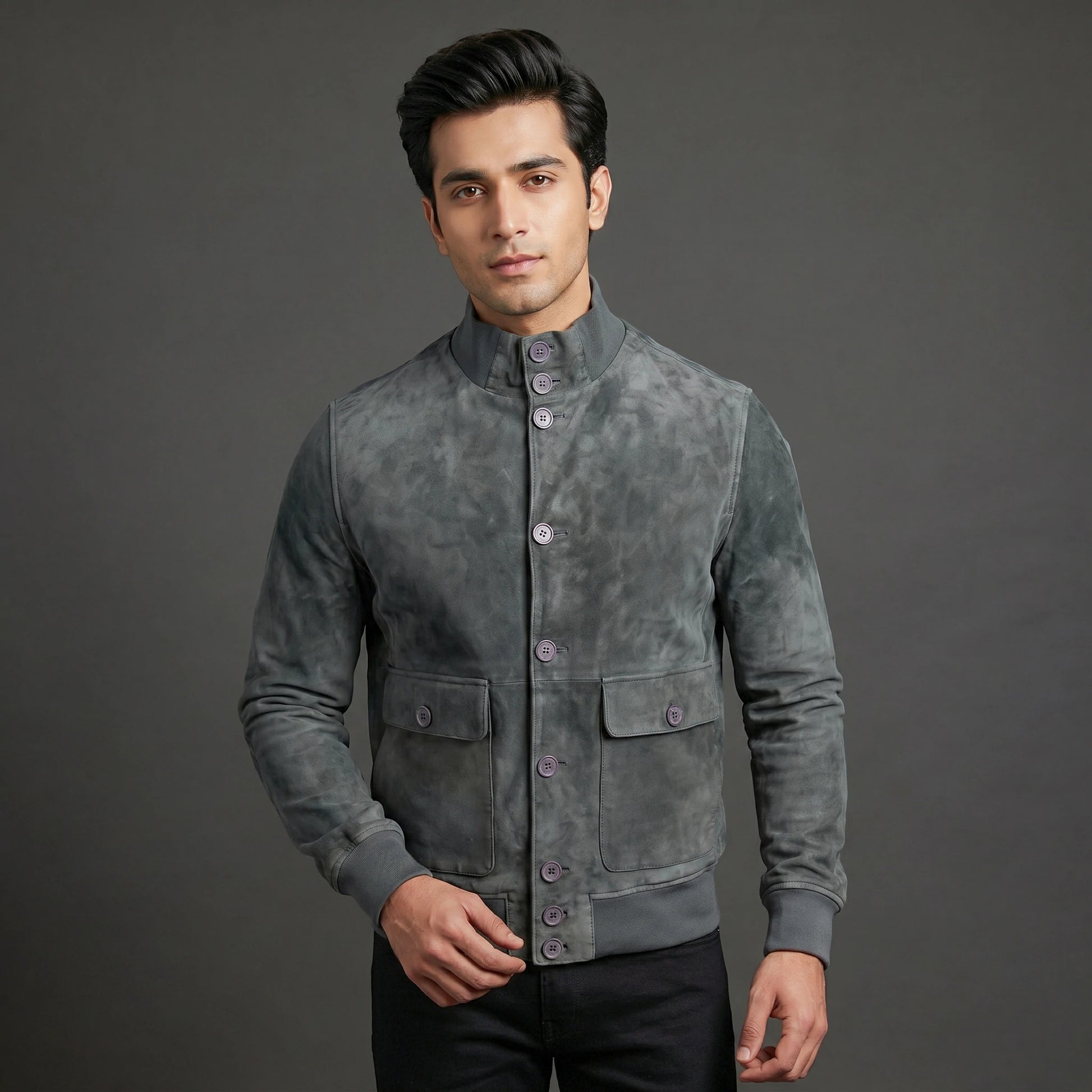 Suede jacket with mandarin collar, button closure, flap pockets, and slim fit.