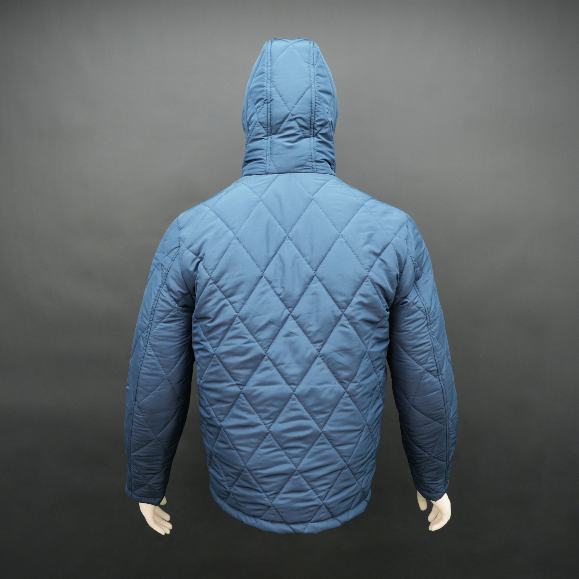 Men’s blue hooded diamond-quilted puffer jacket with full sleeves, zip closure, and pockets.