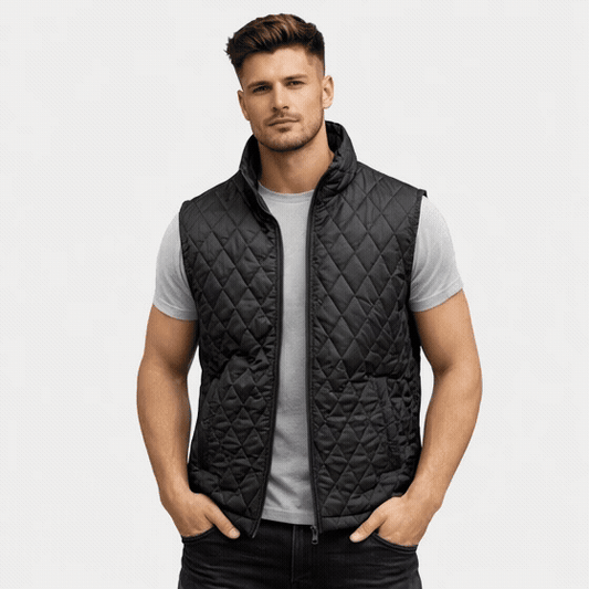 Black sleeveless quilted jacket with front zip, lightweight fabric, and multiple pockets