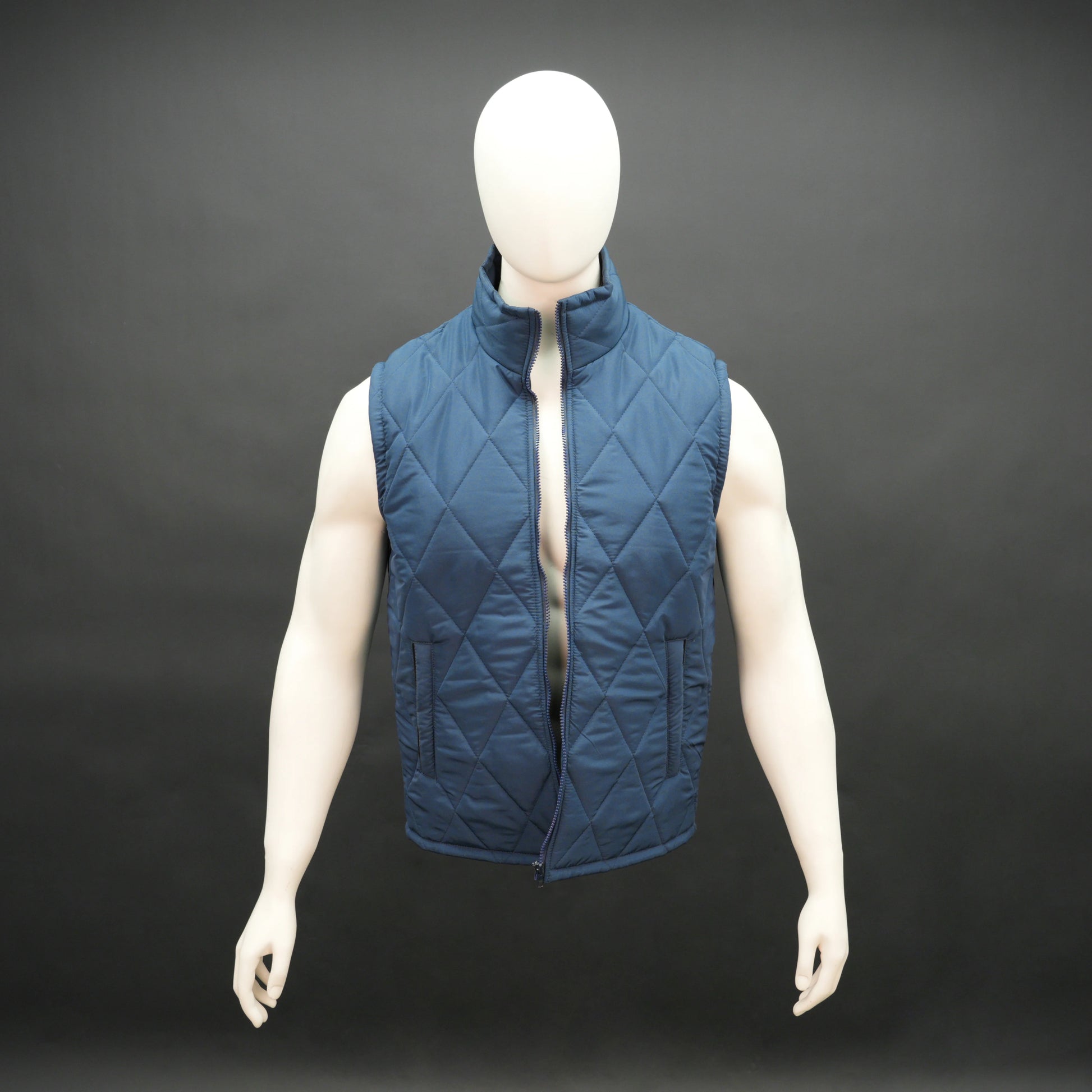 Men’s lightweight diamond quilted sleeveless puffer gilet with front zip, three pockets, available in navy, green, and blue