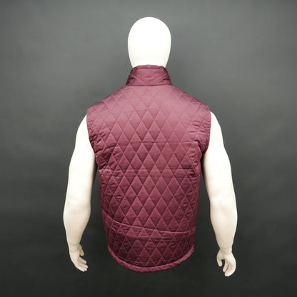 Maroon sleeveless quilted jacket with front zip, lightweight fabric, and multiple pockets