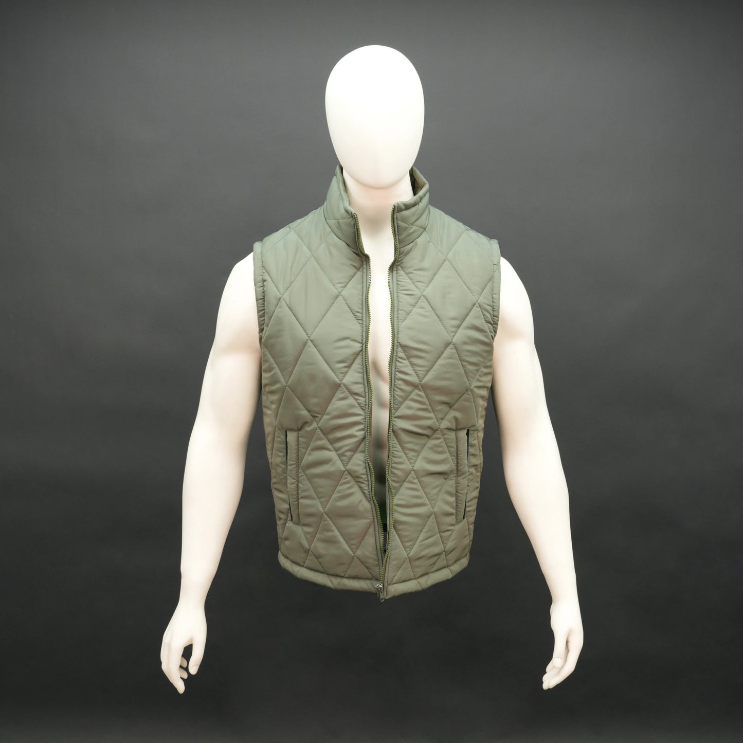 Men’s green lightweight quilted puffer gilet sleeveless zip vest with pockets for layering.