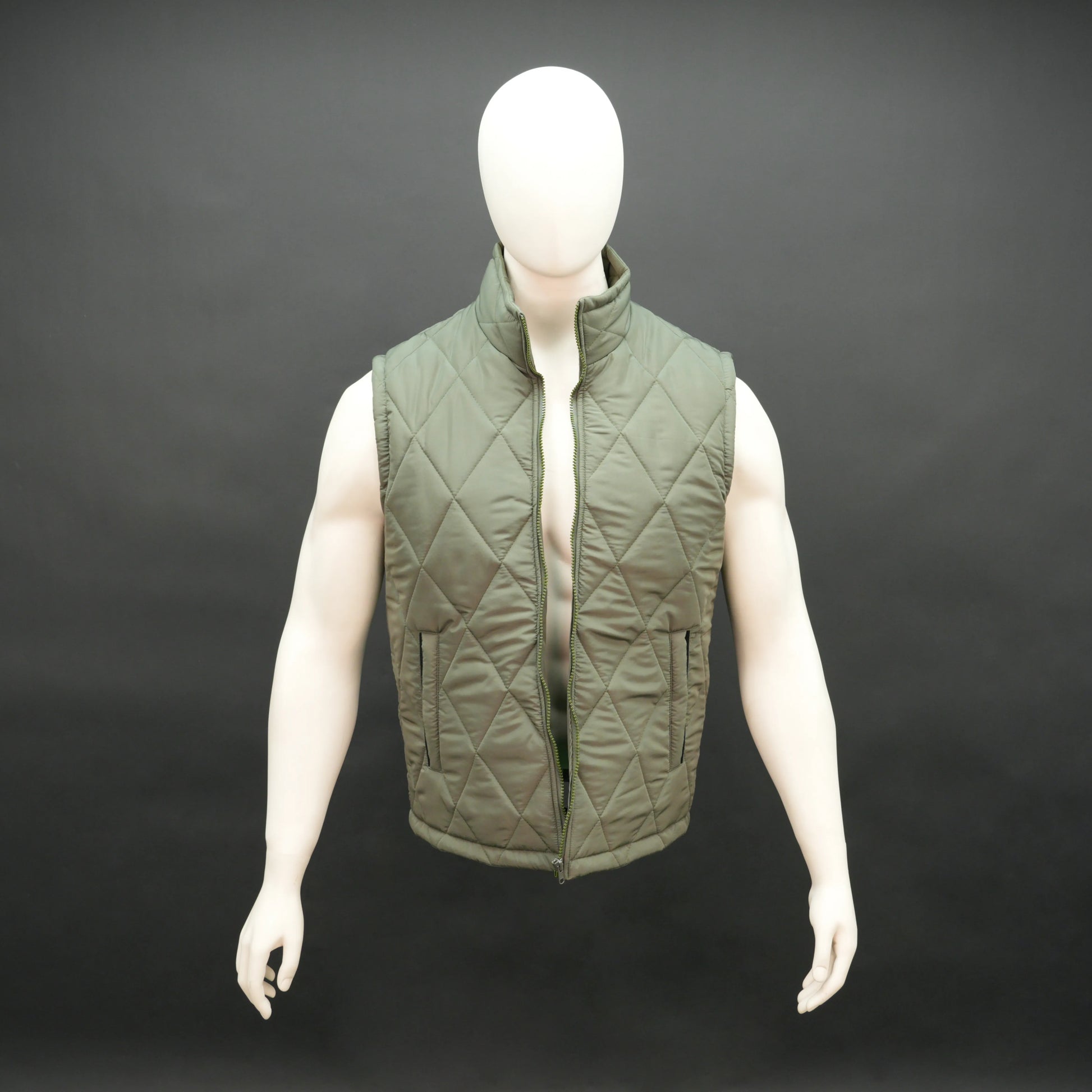 Men’s green lightweight quilted puffer gilet sleeveless zip vest with pockets for layering.