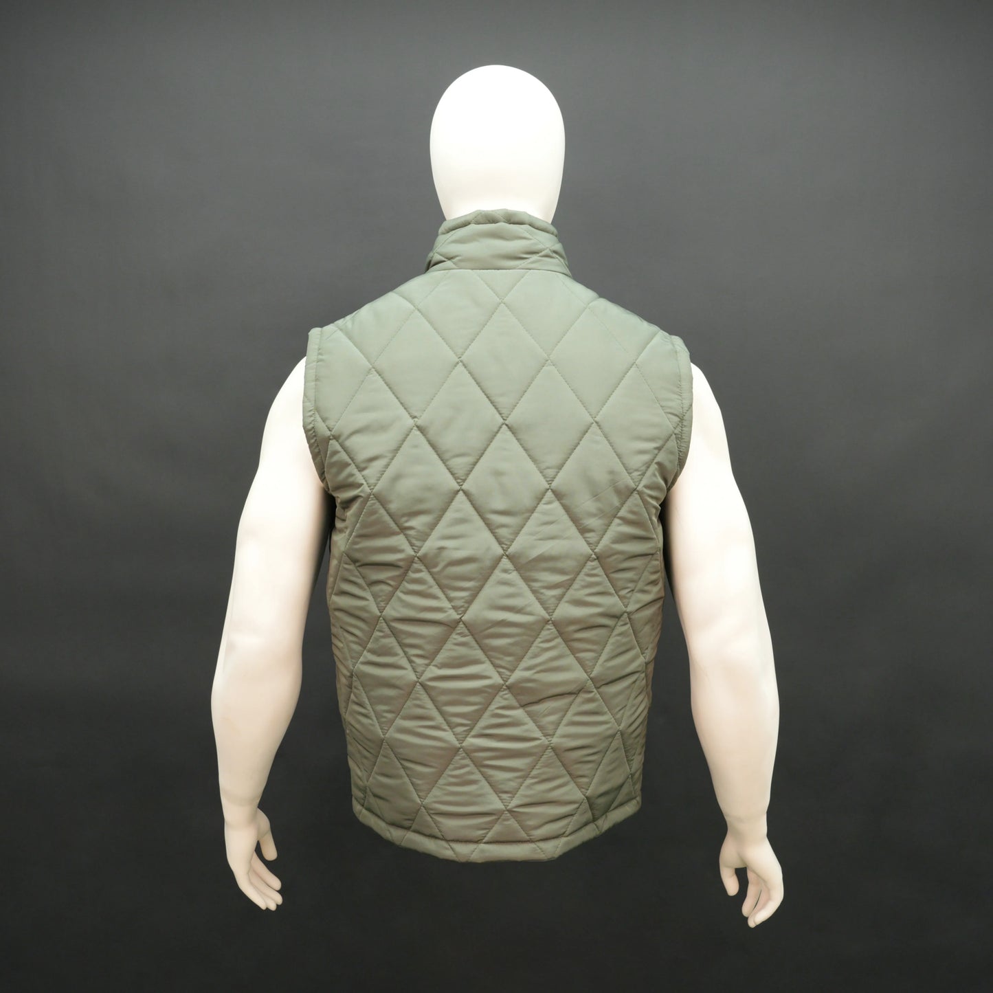 Men’s green lightweight quilted puffer gilet sleeveless zip vest with pockets for layering.