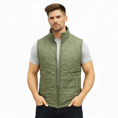 Men’s green lightweight quilted puffer gilet sleeveless zip vest with pockets for layering.