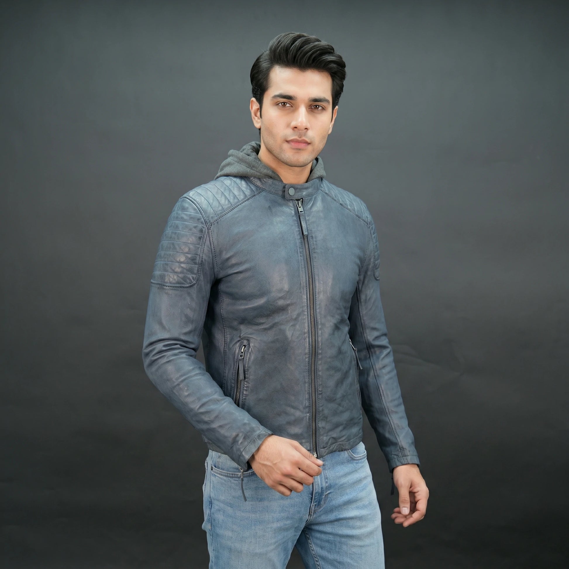 Men's navy blue leather jacket with grey hood and slim fit design