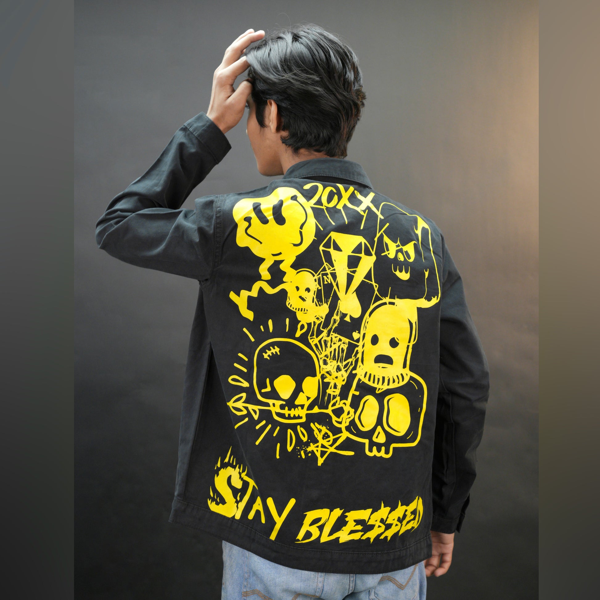 Black denim shirt featuring a bold "Stay Blessed" graphic on the back, button-down front, adjustable cuffs, and side pockets—durable, relaxed fit, and perfect for casual wear.