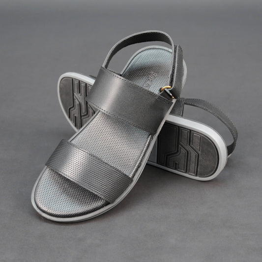 Cow-printed leather footwear with cushioned insole and durable TPR sole for comfort and grip.