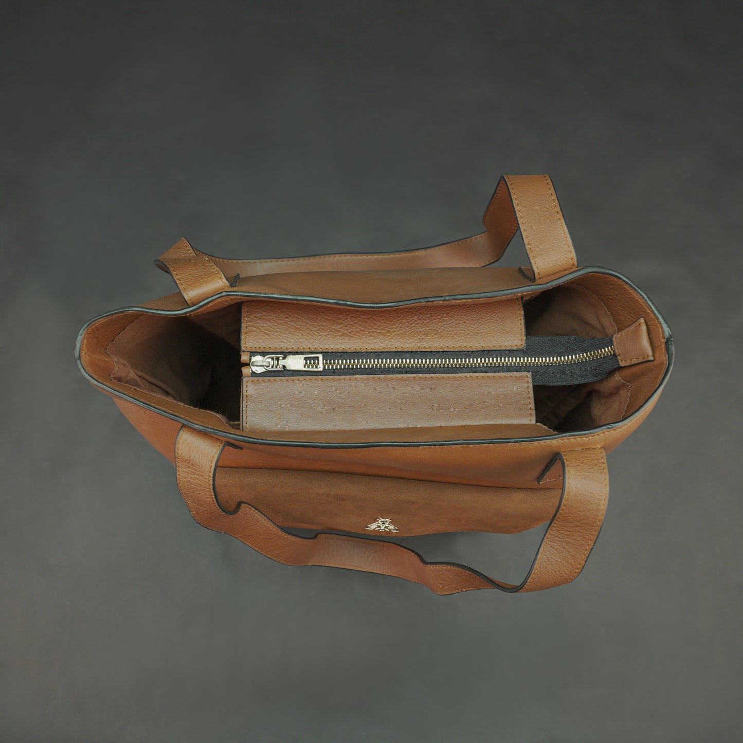 Neverfull Casetto genuine cowhide leather tote bag with spacious interior, strong comfortable handles, and elegant minimalist design—perfect for work, shopping, travel, and everyday use.
