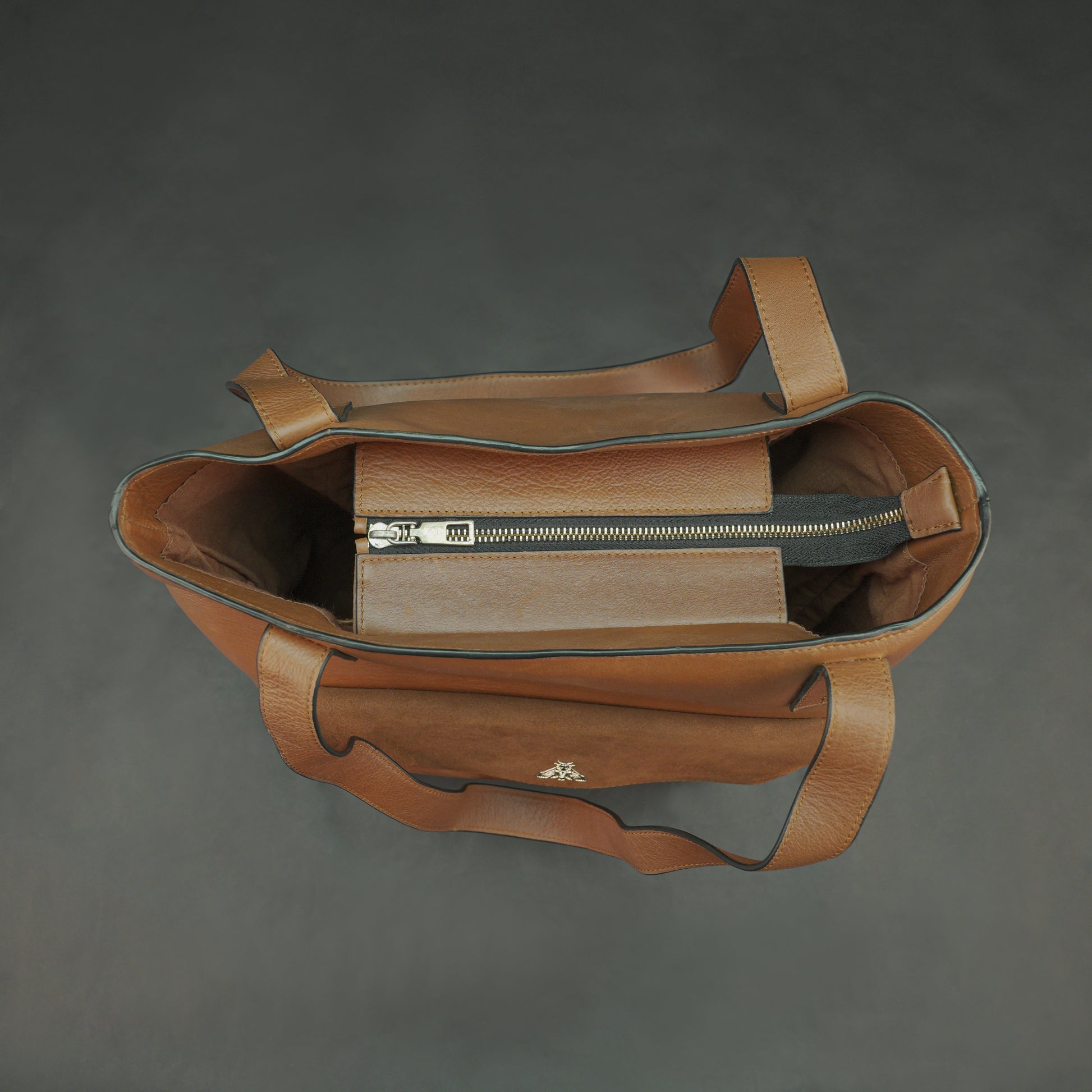 Neverfull Casetto genuine cowhide leather tote bag with spacious interior, strong comfortable handles, and elegant minimalist design—perfect for work, shopping, travel, and everyday use.