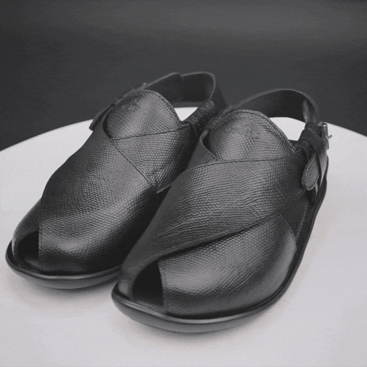 Black cow-printed W-Series leather shoe with goat leather lining, leather and EVA insole, and durable TPR sole.