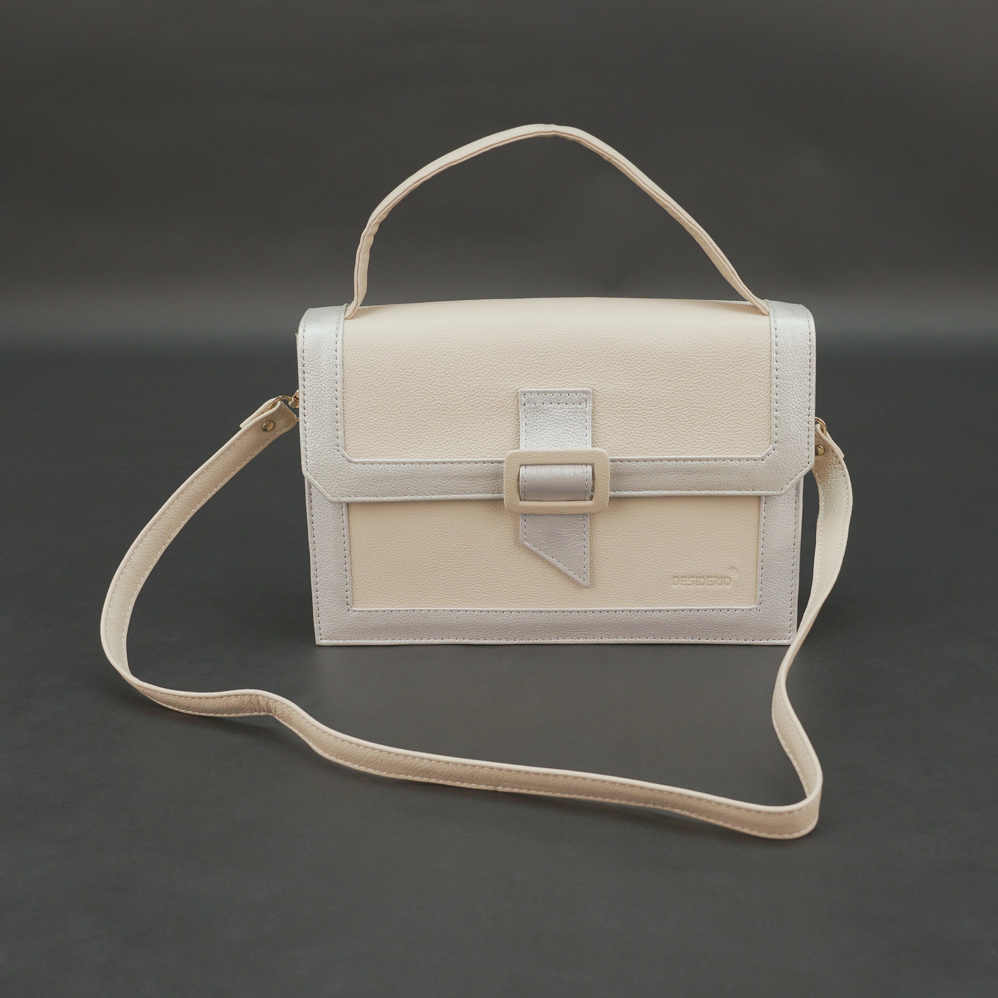 Beige leather crossbody handbag with zipper compartment.