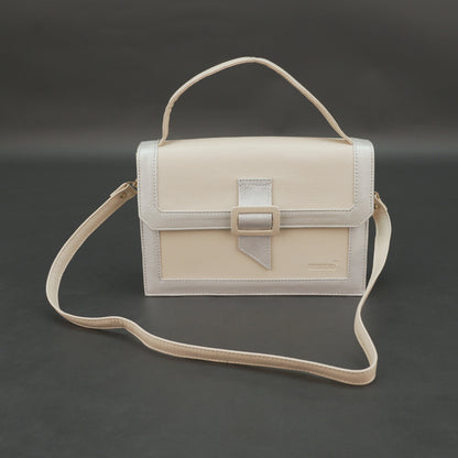 Beige leather crossbody handbag with zipper compartment.