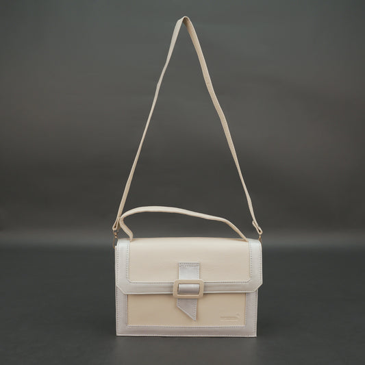 Beige leather crossbody handbag with zipper compartment.