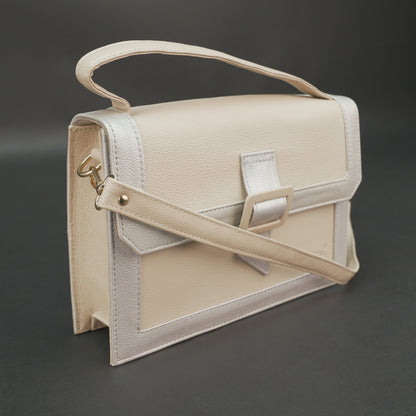 Beige leather crossbody handbag with zipper compartment.