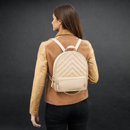 Backpack with adjustable straps, zipper pockets, and spacious main compartment.