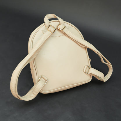 Backpack with adjustable straps, zipper pockets, and spacious main compartment.