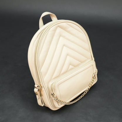 Backpack with adjustable straps, zipper pockets, and spacious main compartment.
