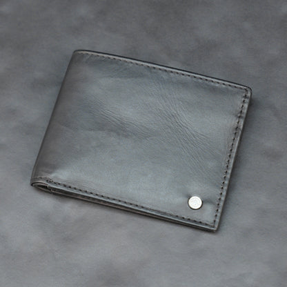 Black leather wallet with 10 card slots and 2 cash compartments, sleek, slim, and durable for everyday use