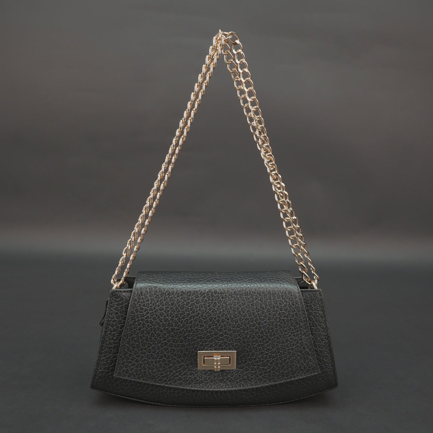 Real leather black handbag with brass chain, zipper compartment, shoulder strap, stylish and practical daily use bag