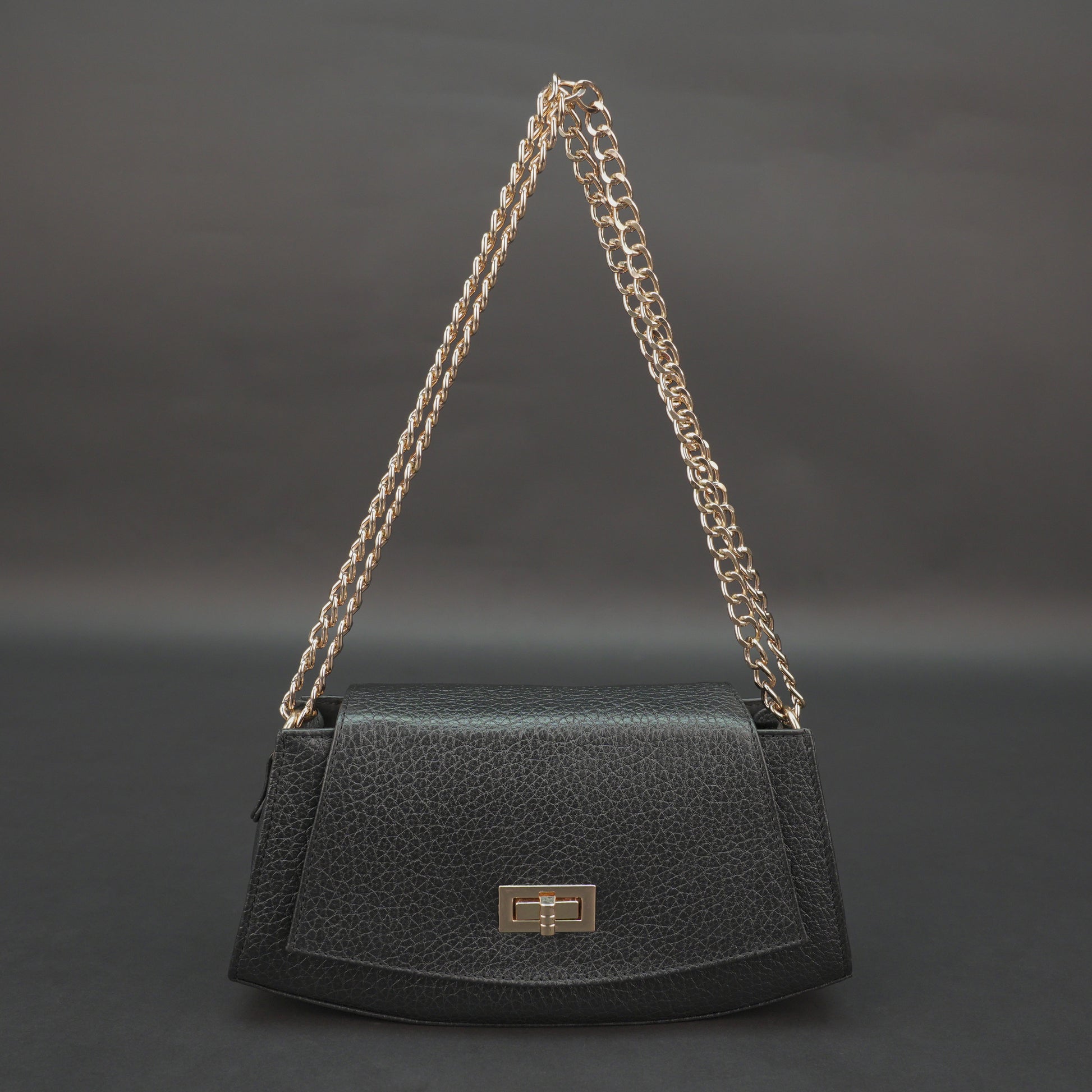 Real leather black handbag with brass chain, zipper compartment, shoulder strap, stylish and practical daily use bag
