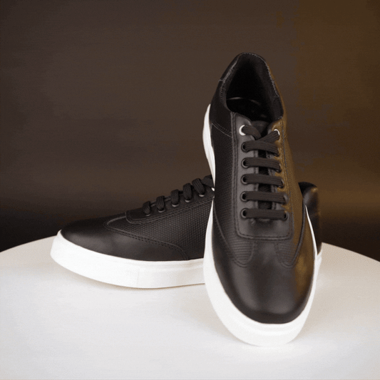 Black cow printed leather sneakers with mesh lining and TPR sole for comfort and durability
