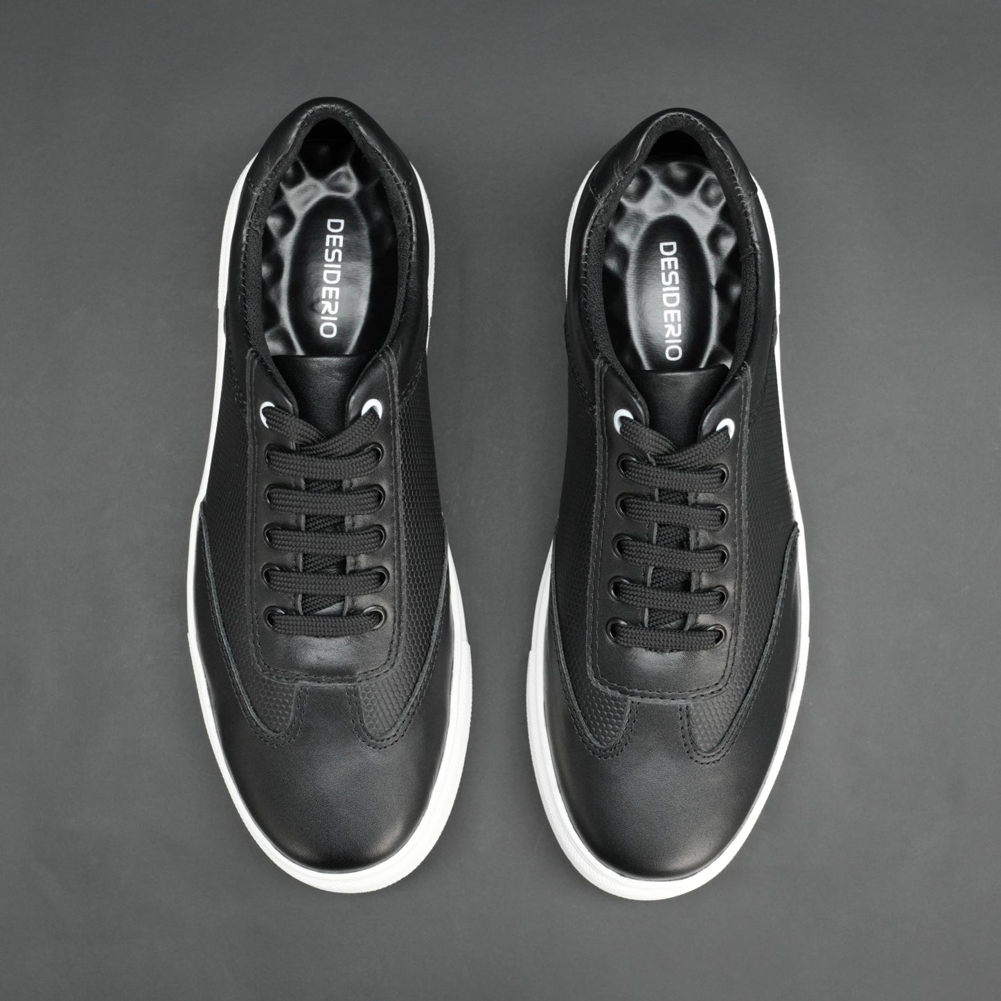 Black cow printed leather sneakers with mesh lining and TPR sole for comfort and durability