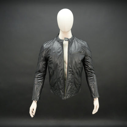 Men’s black jacket with front zip closure, two side pockets, one upper right front pocket, zip cuffs, snap-button collar, and an inside zipper pocket, combining style and functionality