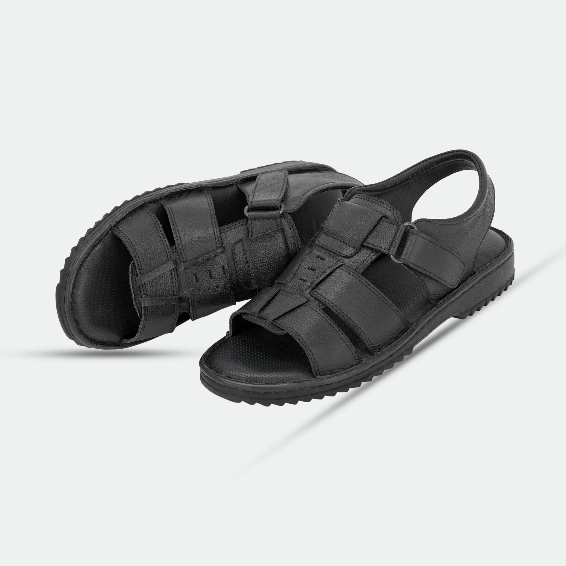 Black handmade genuine leather sandal with classic design, comfort, and durable build for everyday and traditional wear