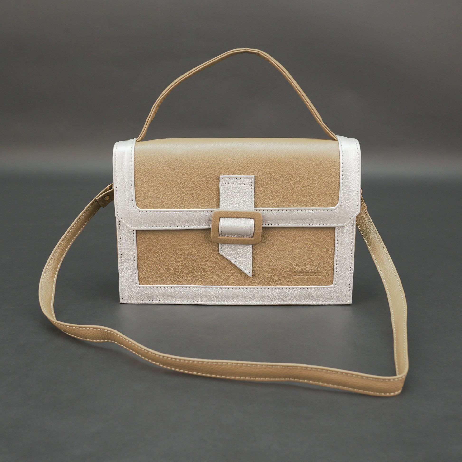 Brown leather crossbody handbag with zipper compartment.