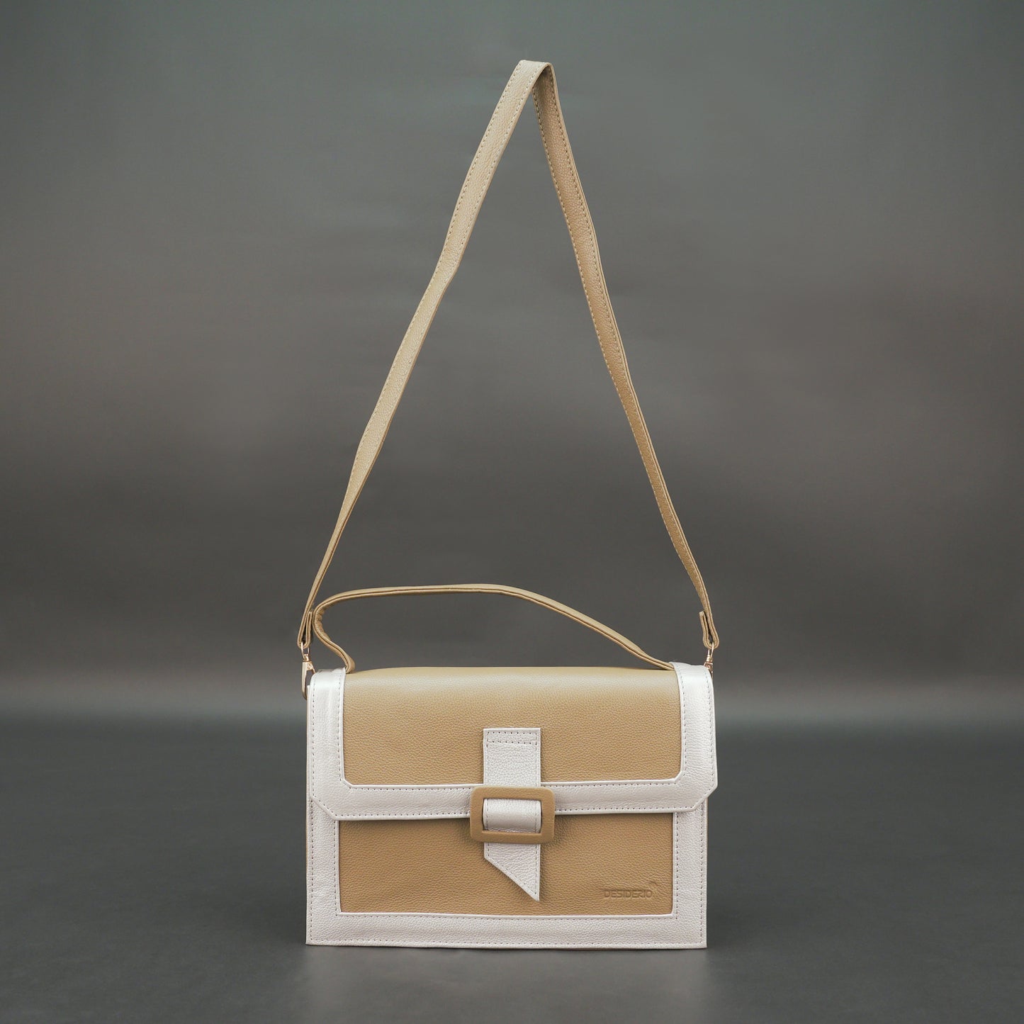 Brown leather crossbody handbag with zipper compartment.