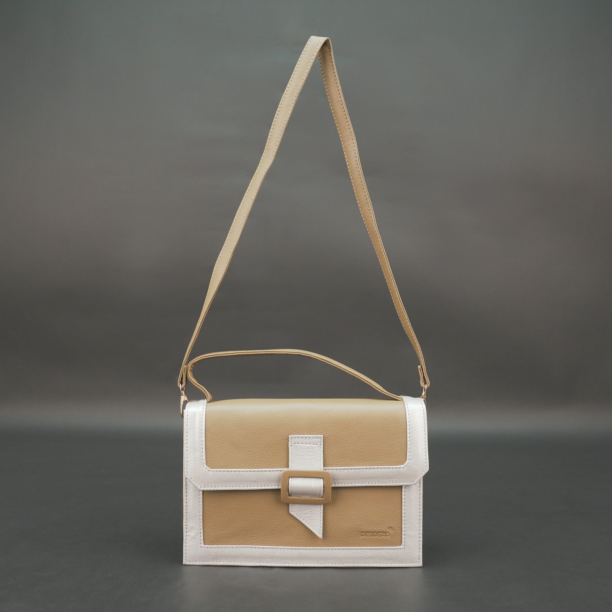 Brown leather crossbody handbag with zipper compartment.
