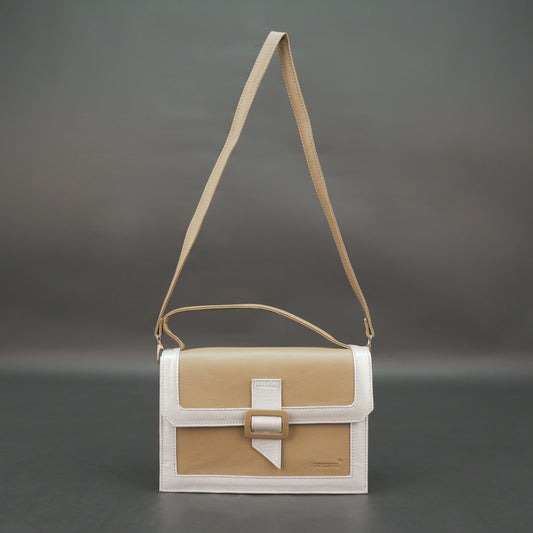 Brown leather crossbody handbag with zipper compartment.