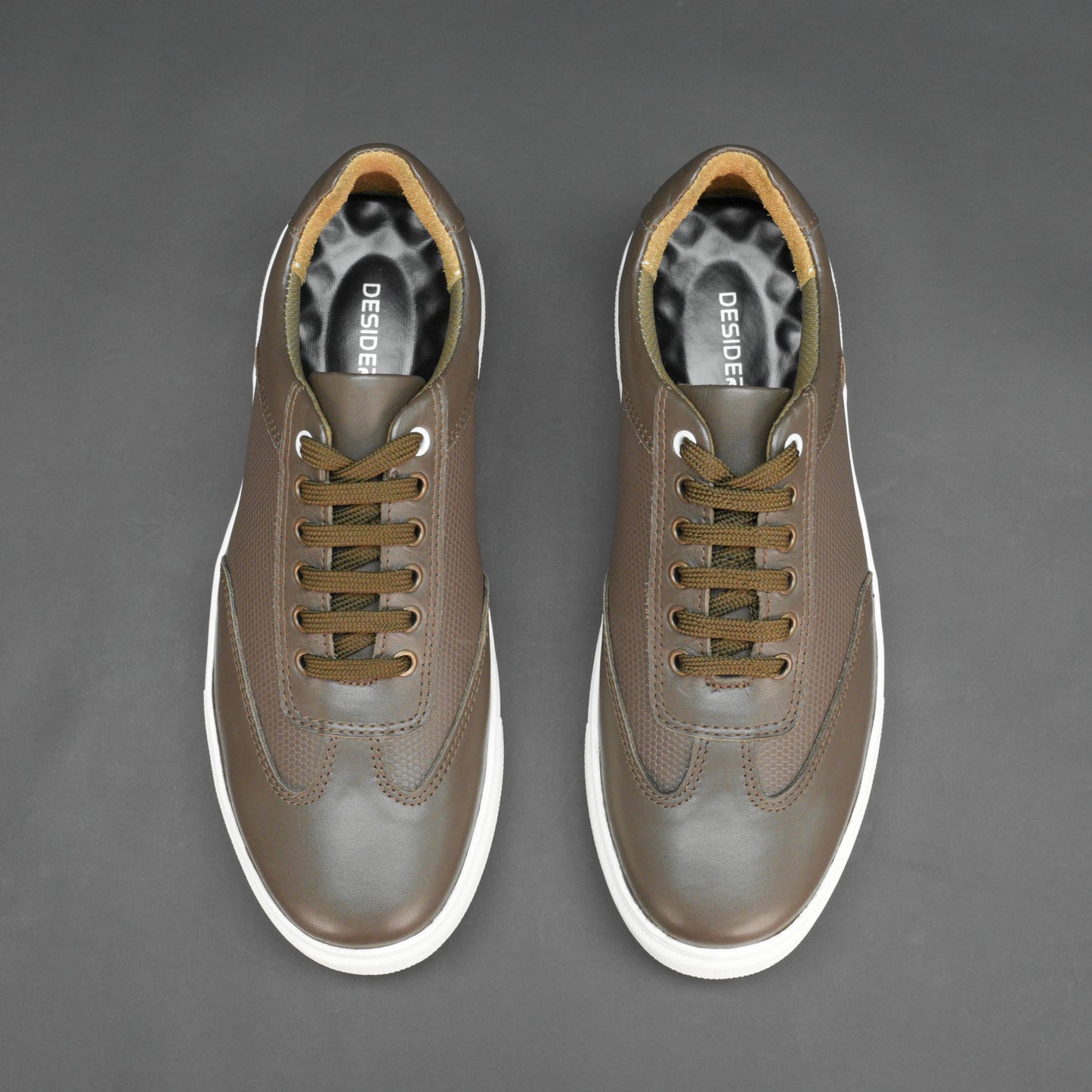 Brown cow printed leather sneakers with mesh lining and TPR sole for comfort and durability